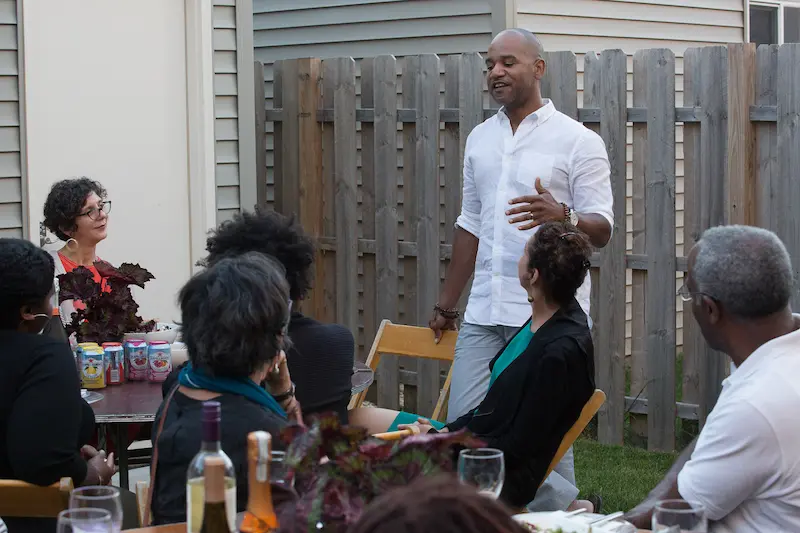 Man speaking at a dinner